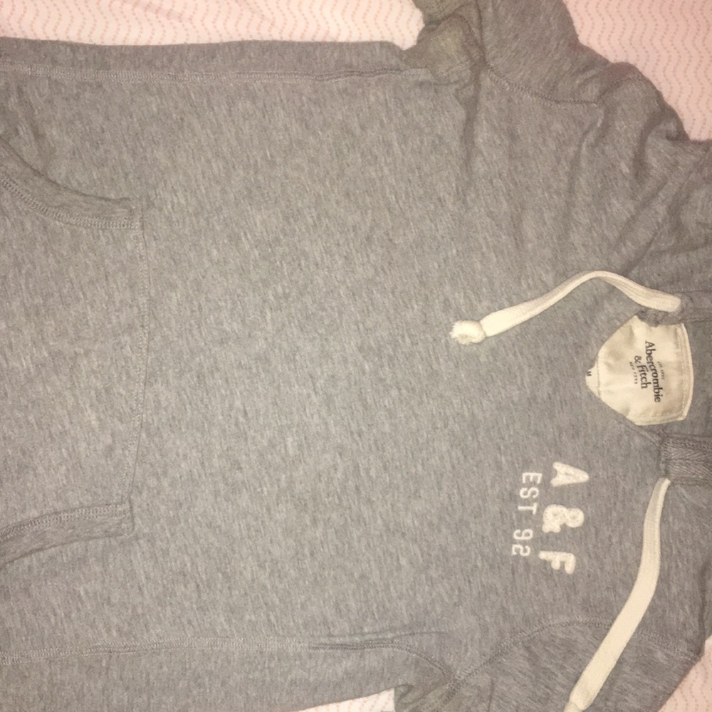 long sleeve shirt with hood and pockets